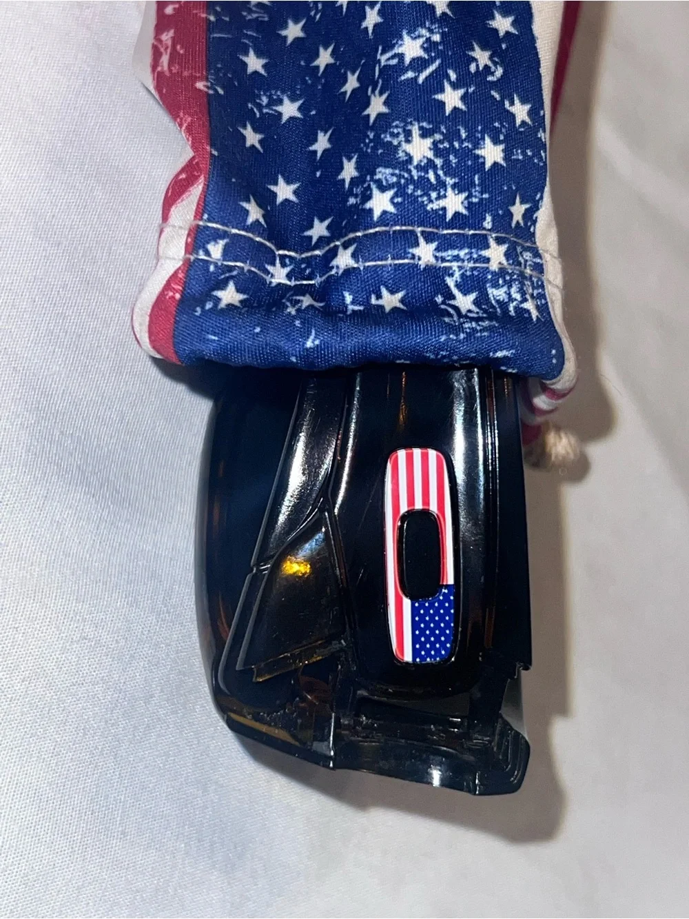 Oakley Tortoise Frame Sunglasses with Blue Lenses and American Flag Accent